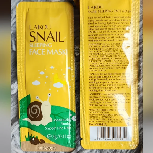 Checkered Cosmetic Pouch with Hair Accessories & Snail Mask - Picture 5 of 6